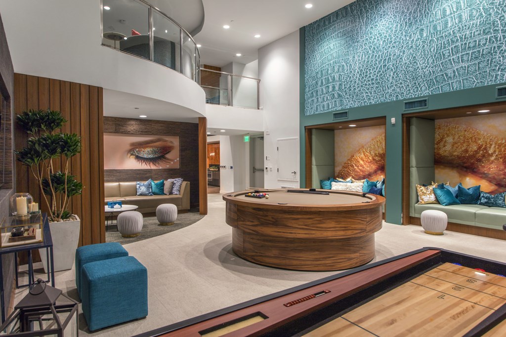 the lobby of a hotel with a reception desk